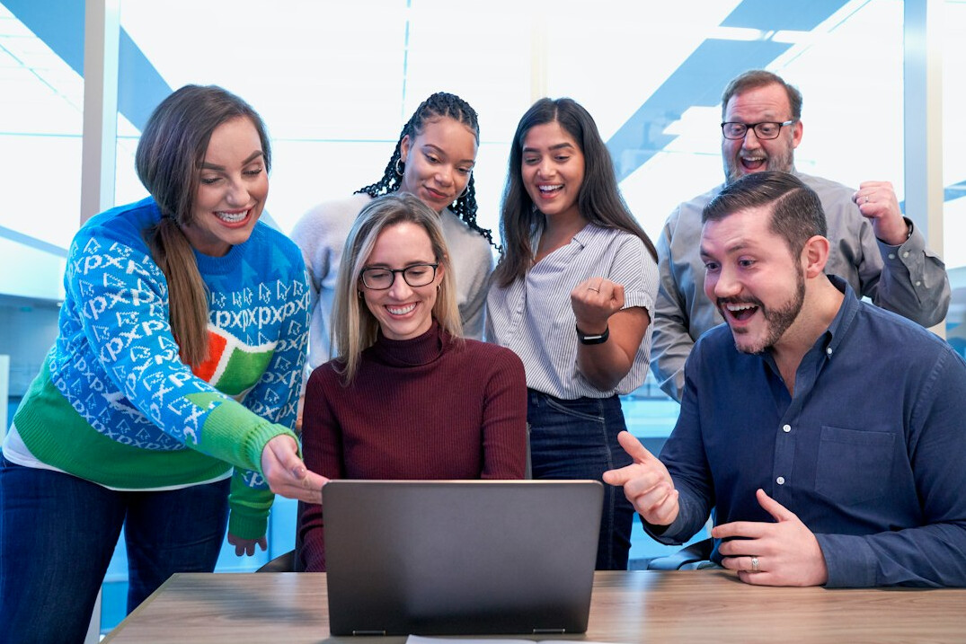 group of adults learning code